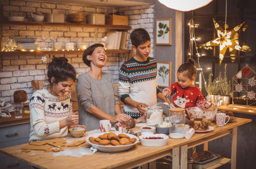 Family spending time together baking on Christmas